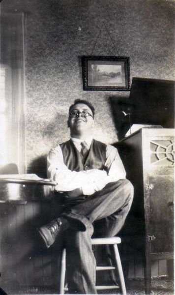Willard Voisin in the parlor at Beal City